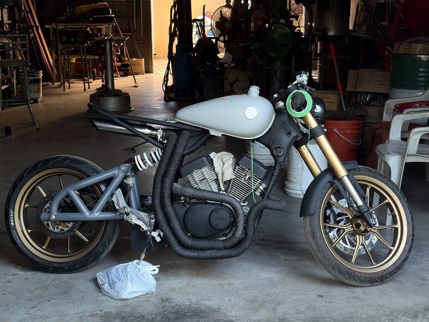 Custom swingarm, subframe and exhaust, in primer