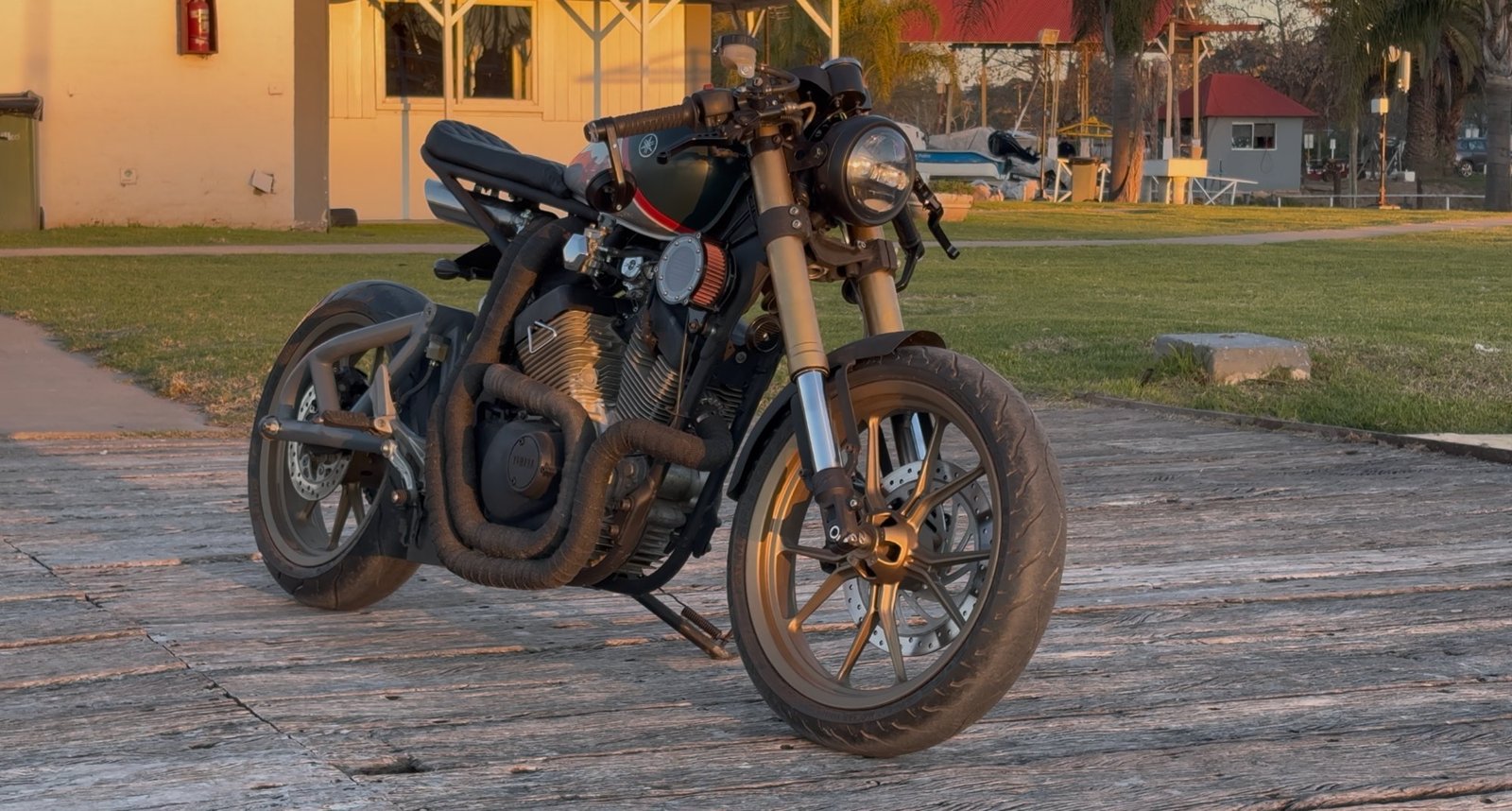 Virago cafe racer, rear three-quarter against the sunset